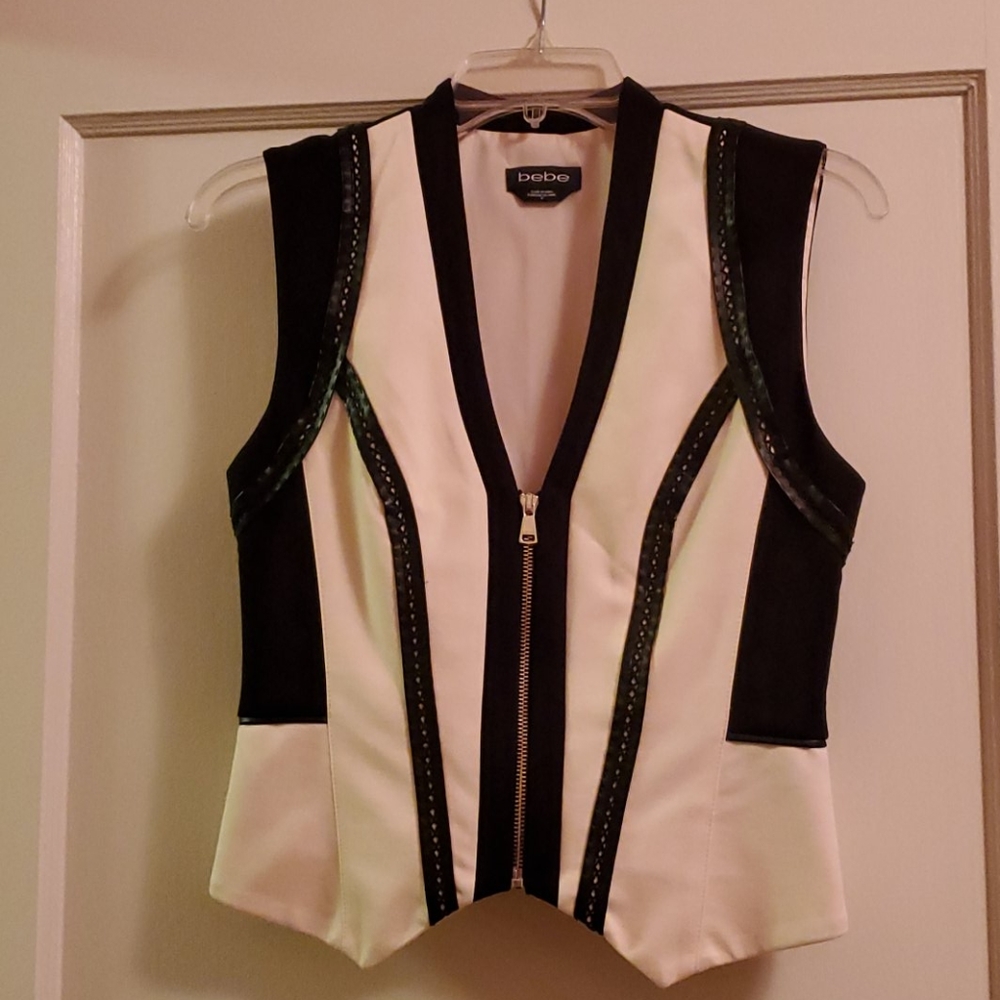 Vest with faux leather trim